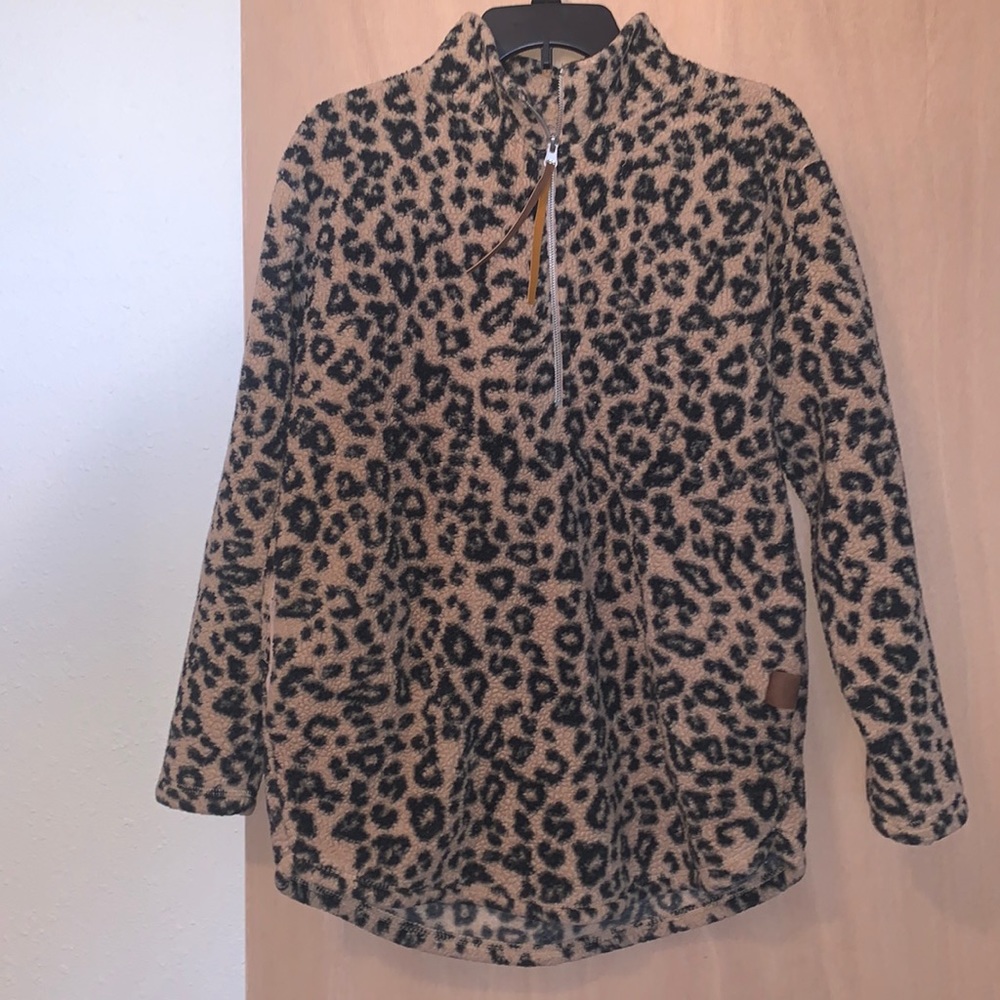 Sherpa half zip pull over/sweater. Cheetah print pattern